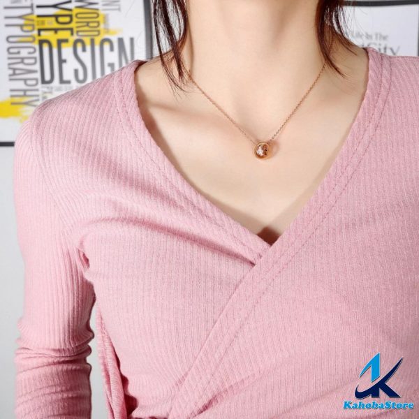 Collar inox dorado rosa argollas cruzadas