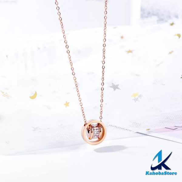Collar inox dorado rosa argollas cruzadas
