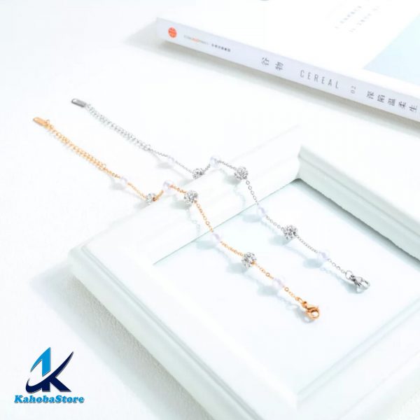 pulsera inox perlas y brillantes