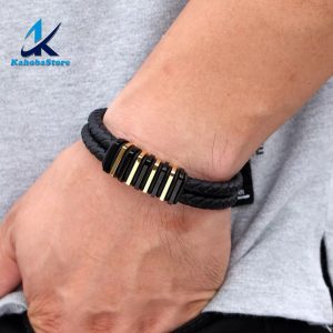 Pulsera de cuero negro y dorado